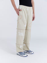 Load image into Gallery viewer, PRINTED LIFTED ZIP TRACK PANT - ALMOND