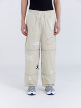Load image into Gallery viewer, PRINTED LIFTED ZIP TRACK PANT - ALMOND
